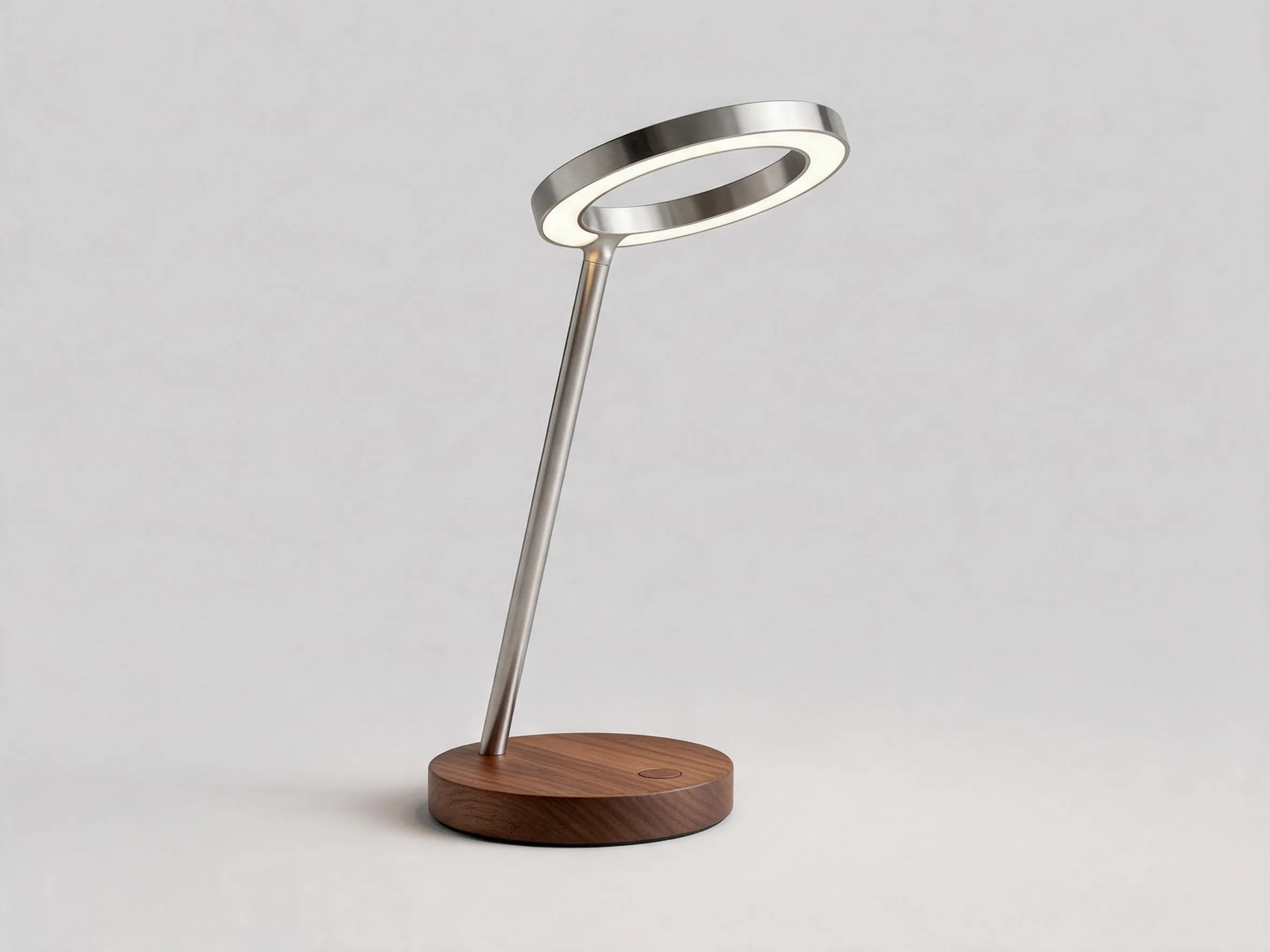 The Halo lamp in brushed steel with a walnut wood base.